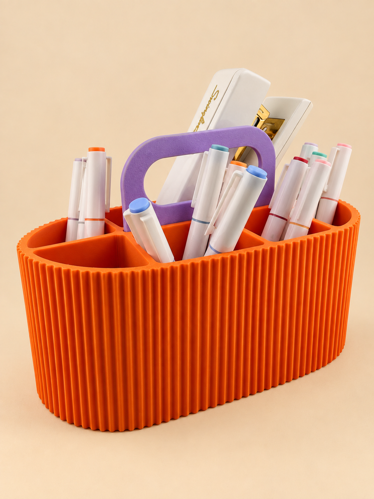 ZIGGY ribbed caddy in tangerine with the handle up