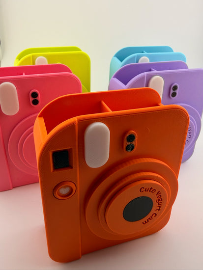 Close-up of the retro camera silhouette of the FLASH tangerine holder