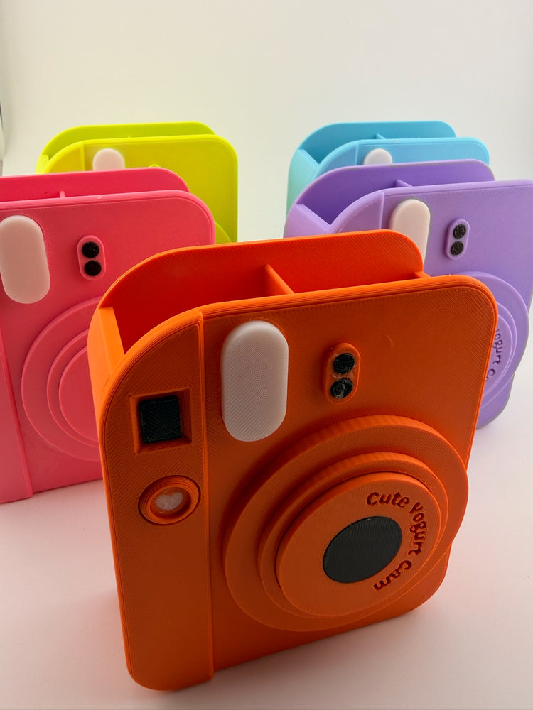 Close-up of the retro camera silhouette of the FLASH tangerine holder