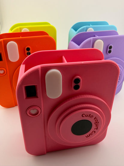 Close-up of the retro camera silhouette of the FLASH pink lemonade holder