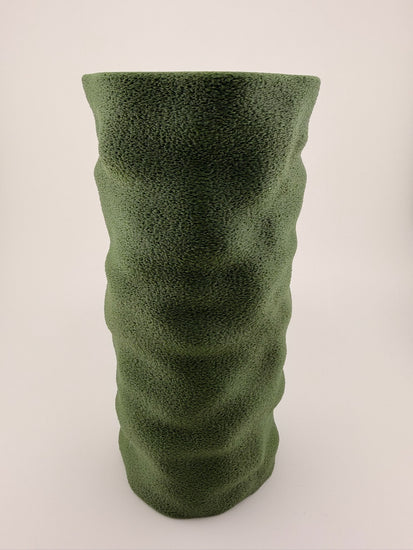 COLUMN sage vase styled on a console