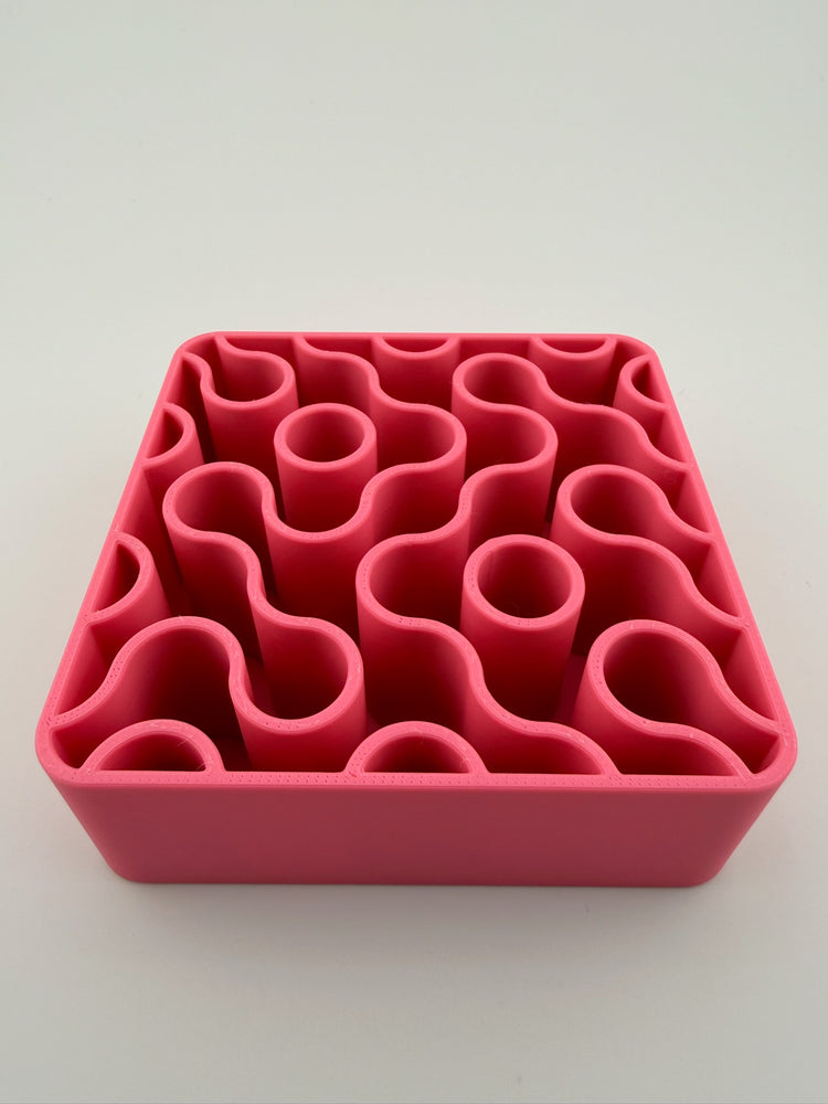 FIZZ pink lemonade holder with pens and brushes standing in it