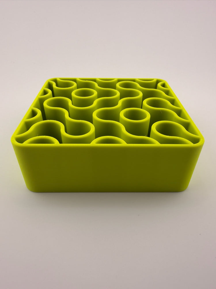 FIZZ lime holder with pens and brushes standing in it