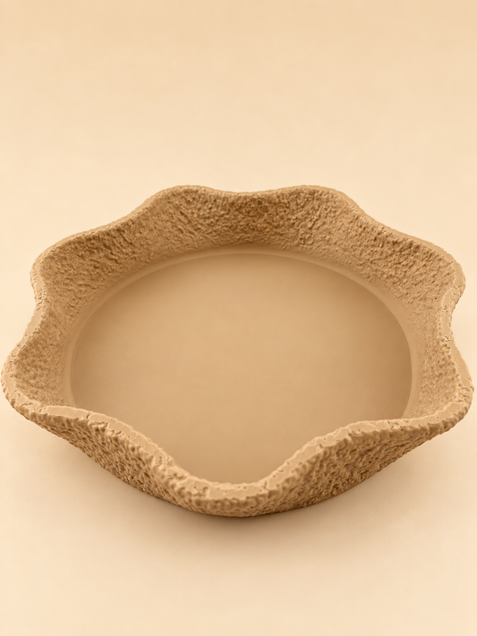 CREST stone-textured tray in vanilla on a console