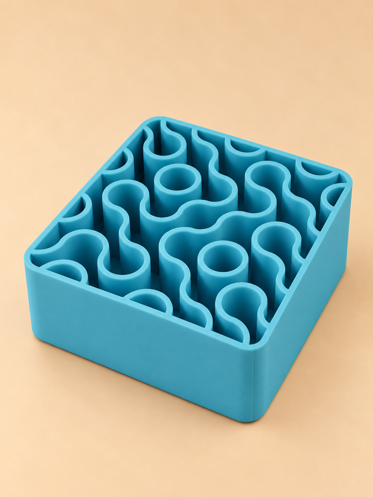 FIZZ wavy pen holder in pool blue on a desk