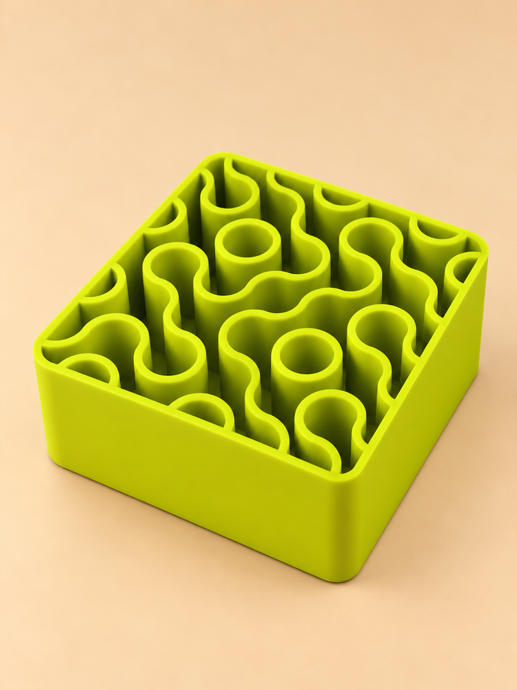 FIZZ wavy pen holder in lime green on a desk