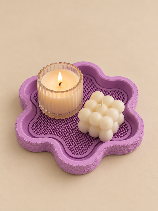 FLORA flower-shaped tray in wisteria on a nightstand