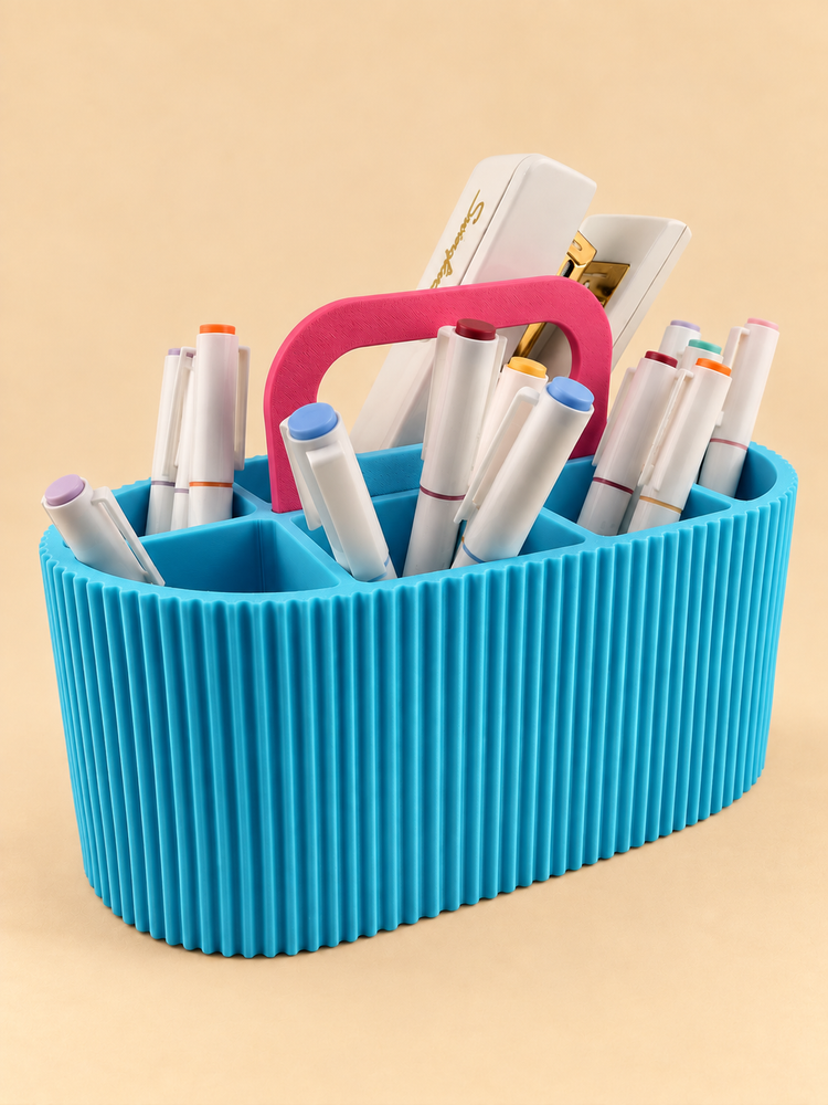 ZIGGY ribbed caddy in pool blue with the handle up